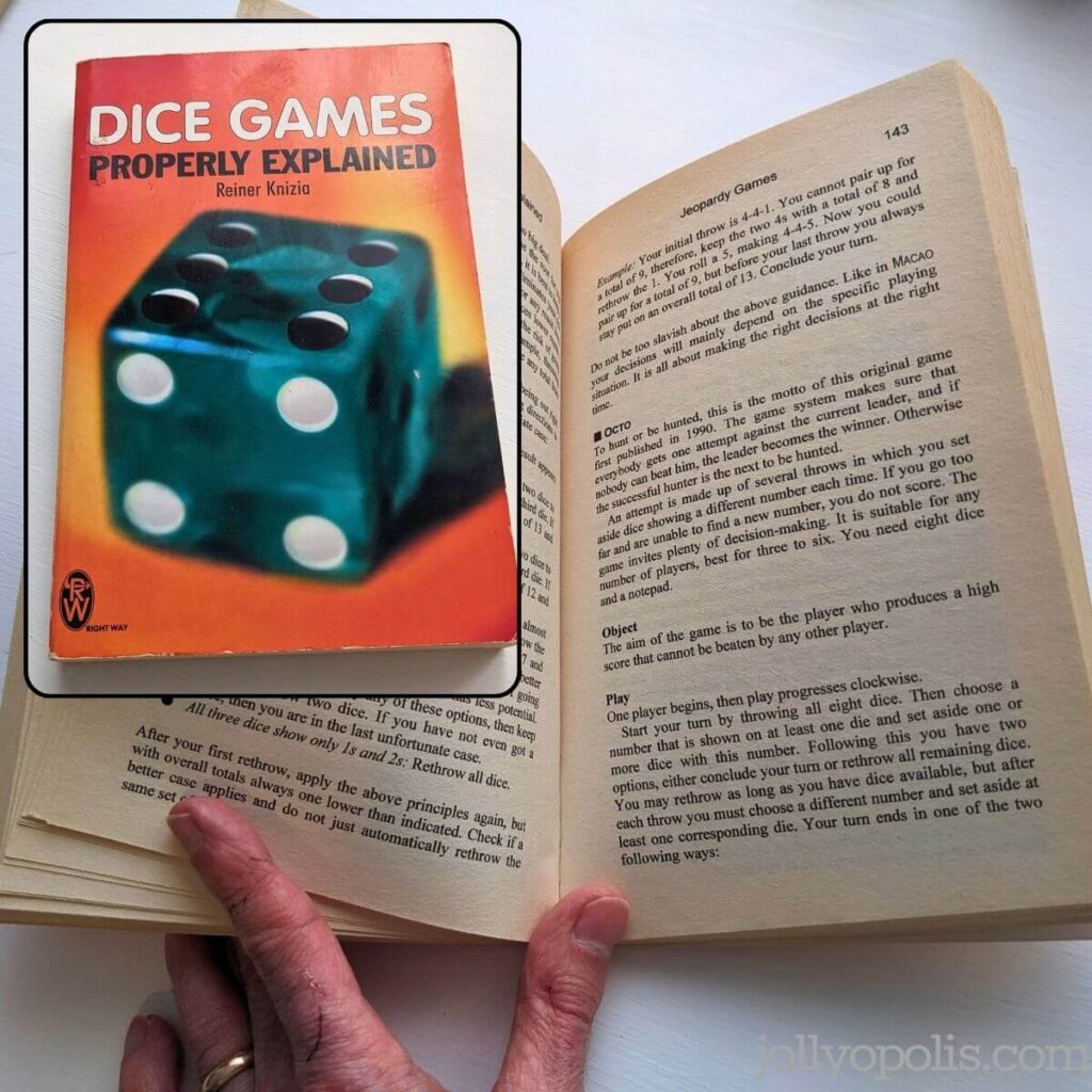 Photos of the cover and inside of Dice Games Properly Explained